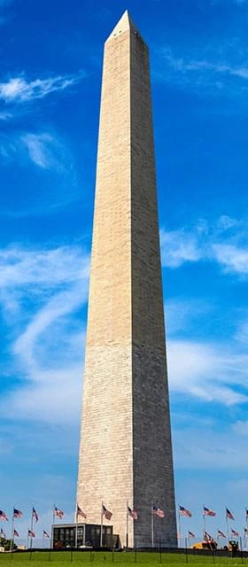 A tall monument standing upright against a clear sky, representing steady, US-made support