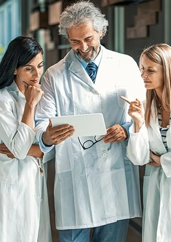 Members of the Boostaro Research Team reviewing formula information