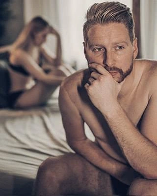 Man looking pensive as everyday stress weighs on his confidence
